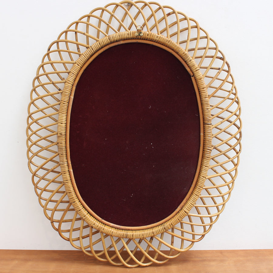 Italian Vintage Rattan Oval Wall Mirror (circa 1960s)