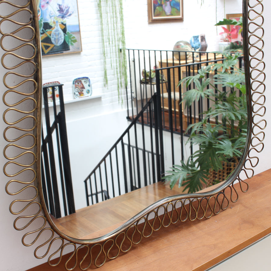 Mid-Century Brass Wall Mirror in the Style of Josef Frank (circa 1960s)