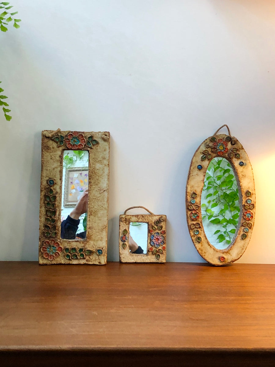 Ceramic Oval Wall Mirror with Floral Enamel Decoration by Atelier La Roue (circa 1960s)