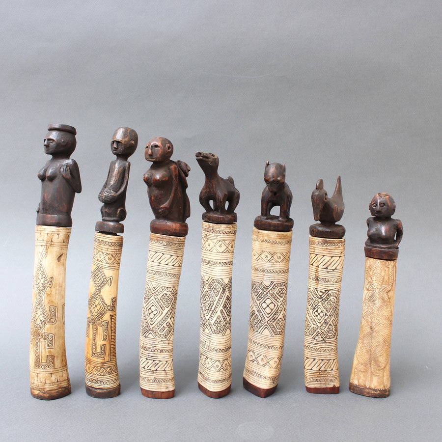 Set of Seven Wood and Bone Lime Powder Holders for Betel Nut from W. Timor Island, Indonesia (circa 1940s - 1960s)
