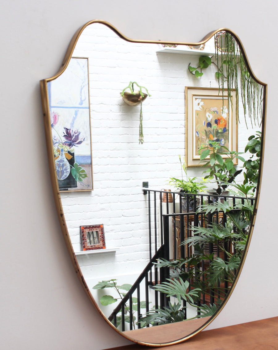 Mid-Century Eared Crest-Shaped Italian Wall Mirror with Brass Frame (circa 1950s)