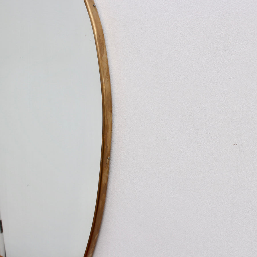 Mid-Century Egg-Shaped Italian Wall Mirror with Brass Frame (circa 1950s)