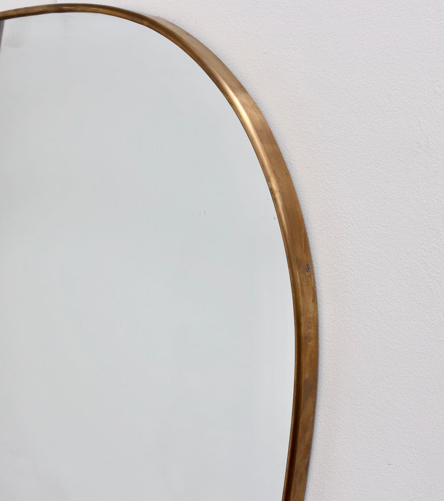 Mid-Century Egg-Shaped Italian Wall Mirror with Brass Frame (circa 1950s)