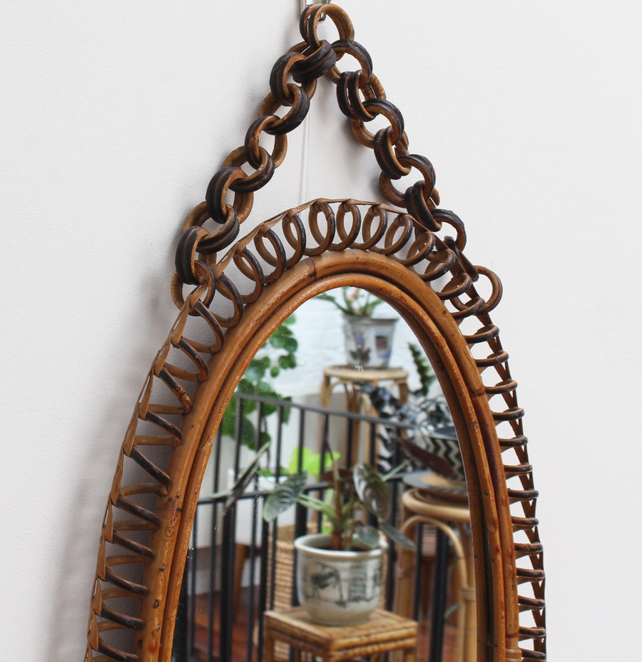 Italian Oval-Shaped Rattan Wall Mirror with Hanging Chain (circa 1960s)
