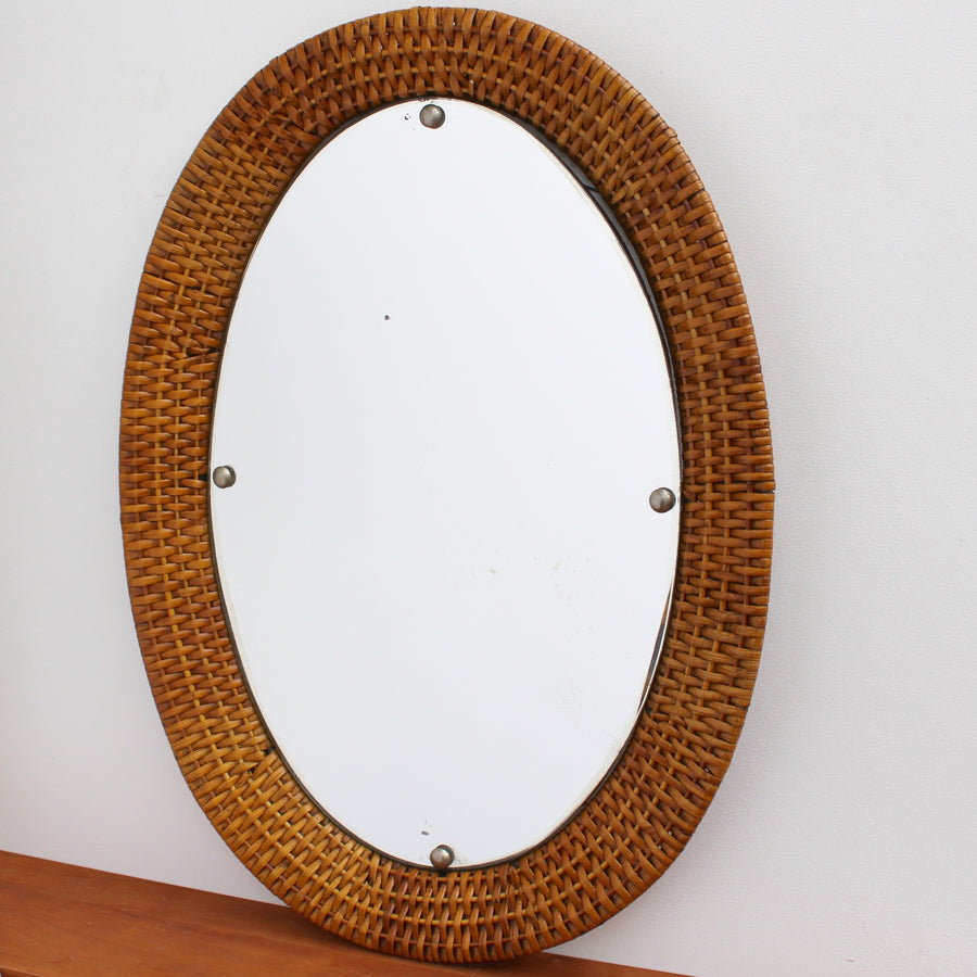 Italian Wicker Rattan Oval-Shaped Wall Mirror (circa 1960s)